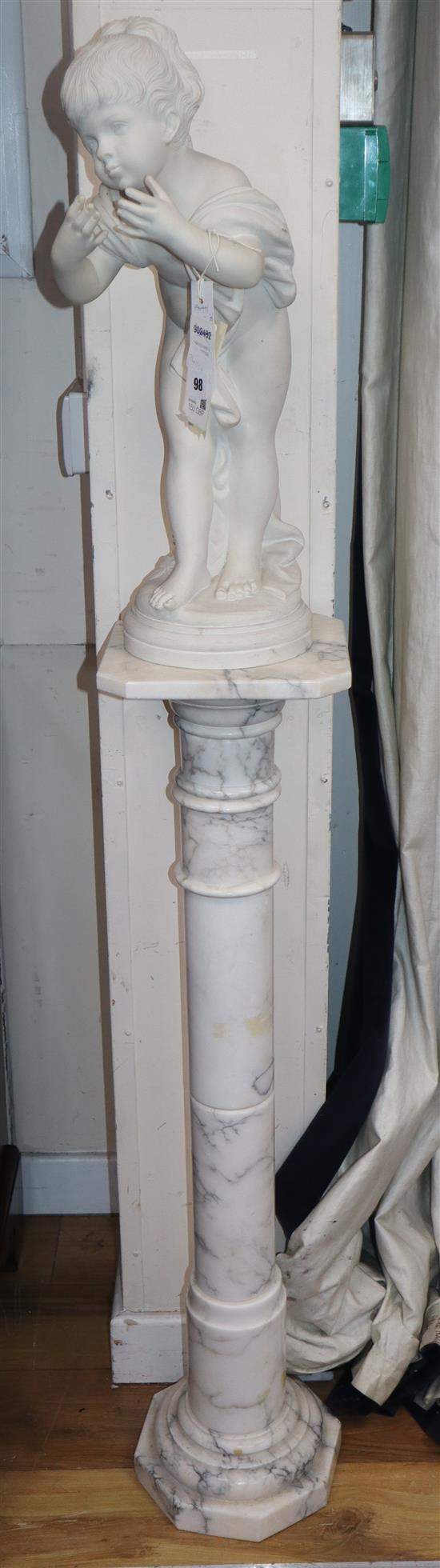 A white composition figure of a nude child, on composition pedestal